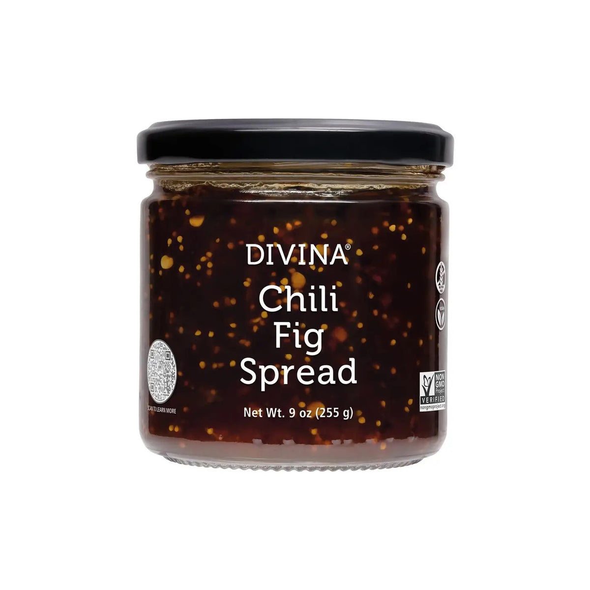 A jar of DIVINA - CHILI FIG SPREAD with a black lid features a label displaying its name and weight, 9 oz (255 g). This dark, sweet, spicy spread with visible seeds is non-GMO and vegan certified—ideal for cheese pairing.