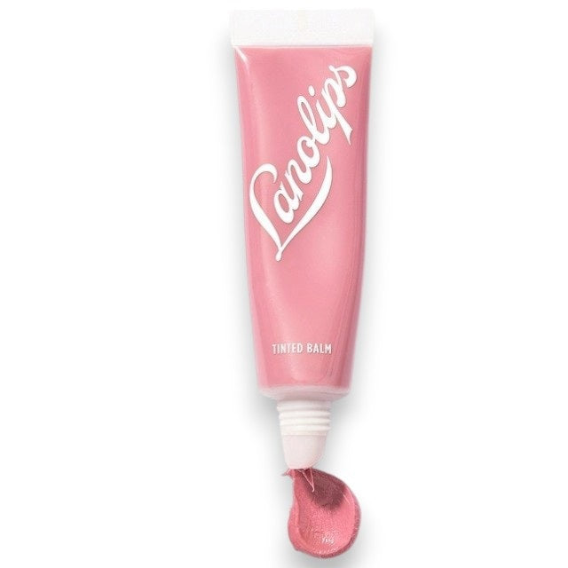 Two forearms with four swatches of LANOLIPS - TINTED LANOLIN LIP BALM IN ROSE shades—Rose, Rhubarb, Perfect Nude, and Spice—display color differences on different skin tones against a light background. Each shade from LANOLIPS offers a look reminiscent of a sheer color lip tint or the subtle hydration delivered by this tinted lanolin lip balm.