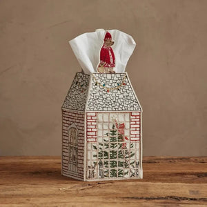 HOME FOR THE HOLIDAYS TISSUE BOX COVER shaped like a house, featuring an embroidered Christmas tree, string lights, and a teddy bear in a Santa hat for festive holiday home decor.