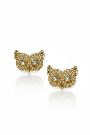 MIGUEL ASES - Owl Stud Earrings with Swarovski Crystals by MIGUEL ASES, INC. feature gold-tone owl designs with intricate beadwork and sparkling crystal eyes, displayed on a white background.