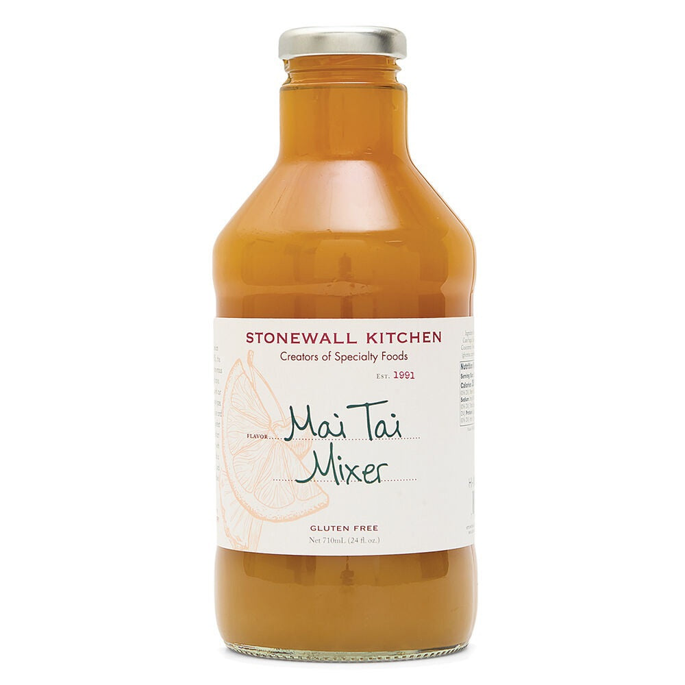 A glass bottle of STONEWALL KITCHEN - MAI TAI MIXER by STONEWALL KITCHEN, filled with vibrant orange liquid; the label displays a citrus illustration and notes that it is gluten free, making it an ideal cocktail mix for preparing a refreshing Hawaiian-inspired drink.