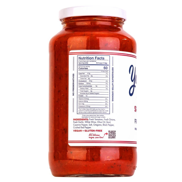 A jar of Yo Mama's Vodka Sauce is shown. The label highlights its fresh ingredients, premium quality, no sugar added, and low-sodium content. KETO Certified and low carb, it has a net weight of 25 oz (708g). "Yo Mama's" is written in large blue script font.
