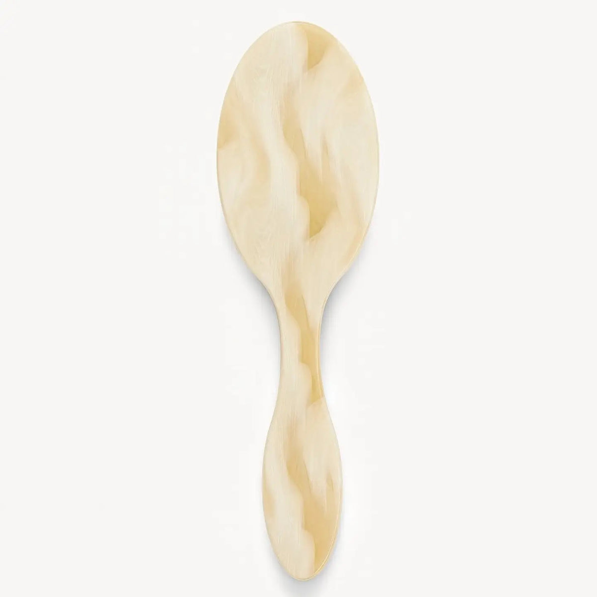 The MACHETE Everyday Detangling Hair Brush in Alabaster features an ivory marbled Italian acetate design, oval head, and curved handle with concealed bristles, shown from above on a plain white background.