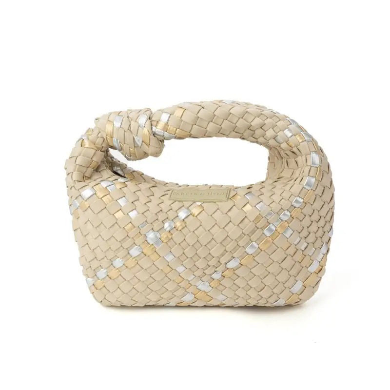 The PARKER &amp; HYDE Woven Knot Bag is a vibrant pink neoprene blend handbag, handwoven with a textured pattern and featuring a knot detail at the top and a visible brand label in the center.