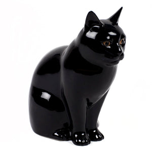 The QUAIL CERAMICS - LUCKY FLOWER VASE SMALL by QUAIL DESIGNS is a glossy black hand-painted stoneware cat figurine with pointed ears and brown eyes, sitting upright against a white background.