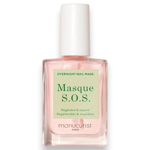 A bottle of MANUCURIST - S.O.S. NAIL MASK by MANUCURIST INC, featuring a white cap and a light green label with product information in both French and English. Specially designed as a hydrating night treatment, this mask targets damaged nails, and the liquid inside is light pink.