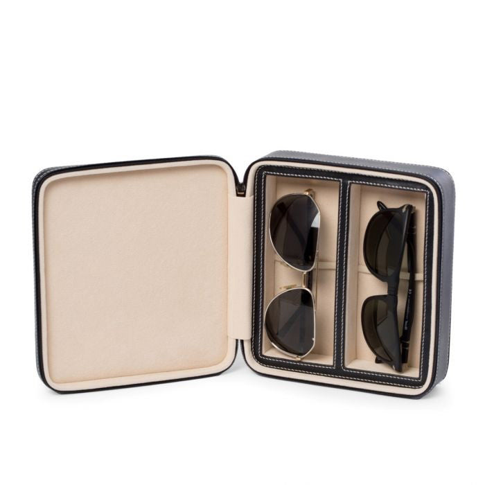The BEYBERK INTERNATIONAL LEATHER SUNGLASS TRAVEL CASE in black and beige features two pairs of sunglasses neatly stored on the right, with the left compartment empty.