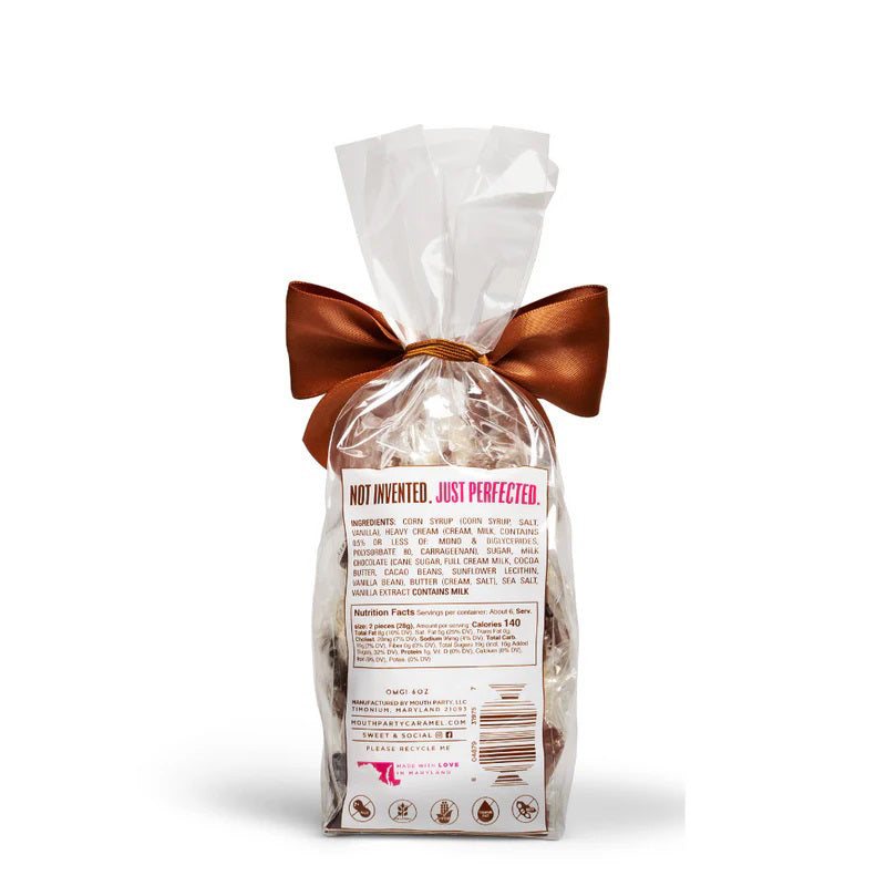 A clear bag of MOUTH PARTY - OMG BAG caramels, including sea salt caramel, is tied with a copper satin bow. The label says &quot;Mouth Party Caramel OMG! NET WT. 6oz (170g).&quot; Brand: MOUTH PARTY.