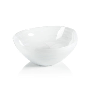 The ZODAX MONTE CARLO ALABASTER GLASS BOWL is a glossy, white, asymmetrical glass bowl measuring 9.75 in x 4.25 in, shown on a white background.