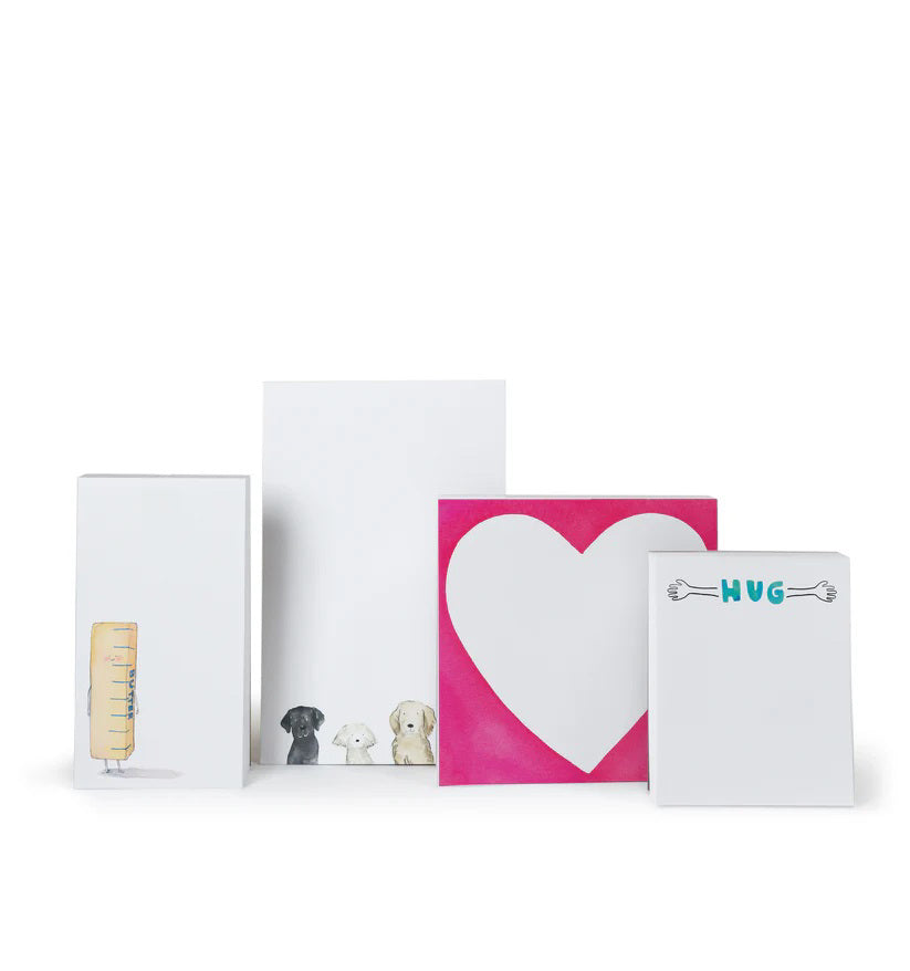 E. FRANCES PAPER's CATS NOTEPAD, made in the USA, features a minimalistic design with recycled paper and charming illustrations of black &amp; white, orange, gray, and brown cats along the bottom edge. The crisp white background offers ample blank space.