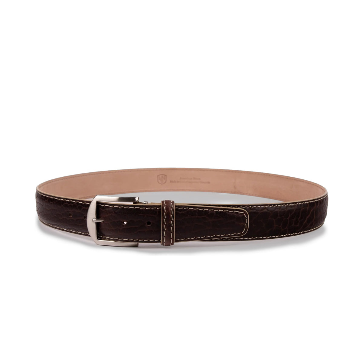 The L.E.N. LIFESTYLE American Bison Belt in brown/beige by LEN LIFESTYLE features genuine leather, a silver buckle, and white stitching, handcrafted in the USA and shown circular on a white background.