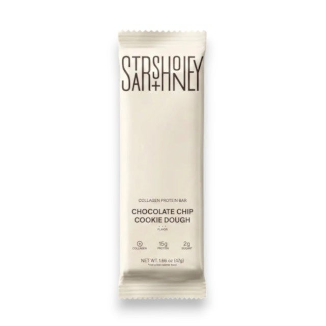 A STARS+HONEY - CHOCOLATE CHIP COOKIE DOUGH protein bar is displayed in white packaging against a neutral background, with the label emphasizing its unique protein blend featuring 15g of protein, only 2g of sugar, and added collagen for a delicious and nourishing snack.