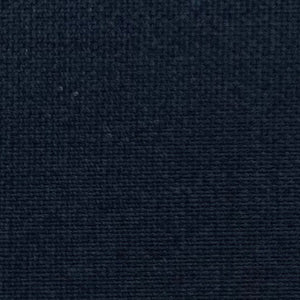 Close-up of MEIMEIJ - PLISSE SKIRT by MEIMEIJ, featuring a textured black fabric with an architectural fine weave pattern.