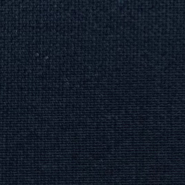 Close-up of MEIMEIJ Plisse Sleeveless Top&#39;s dark textured fabric displays a finely woven pattern. The consistent monochrome color and texture, with subtle weave variations, reflect minimalist elegance.