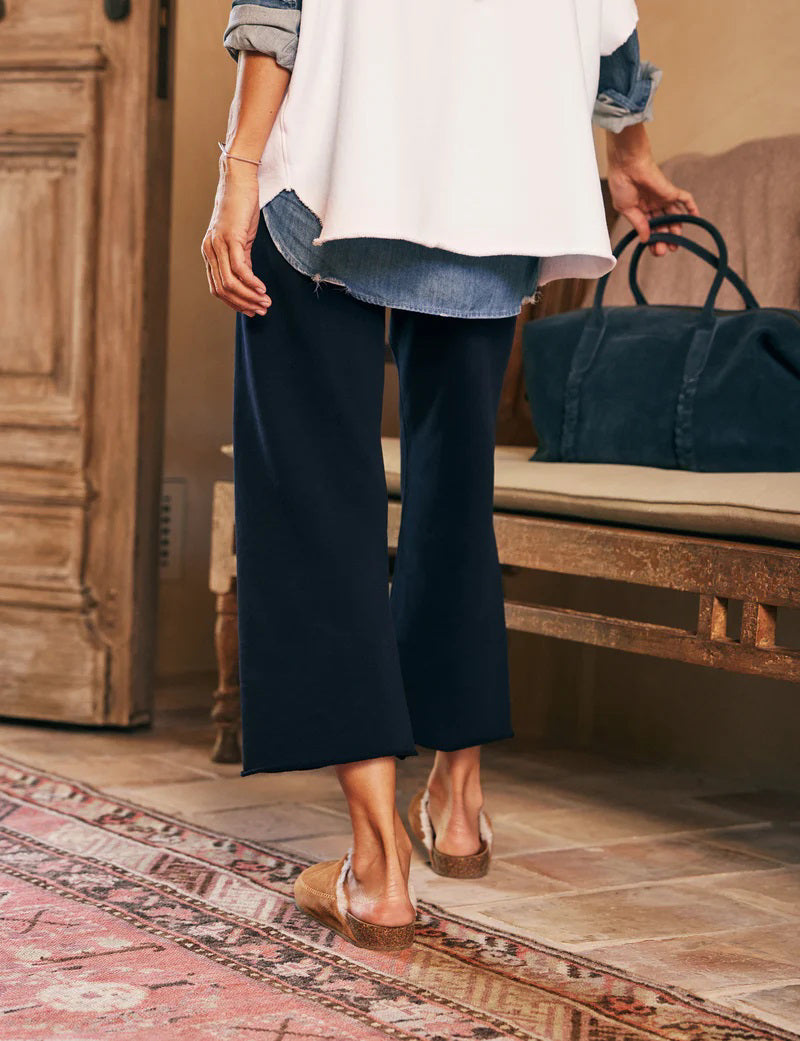 The image showcases the FRANK &amp; EILEEN - CATHERINE Favorite Sweatpant in British Royal Navy, featuring a fashion-forward wide-leg cropped fit with a drawstring waist. The mid-rise sweatpants are displayed against a plain white background.