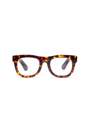 CADDIS D28 Progressive Readers in Turtle feature thick, rectangular acetate frames with a tortoiseshell pattern, shown on a white background and angled slightly to the left—ideal for those seeking premium eyewear.