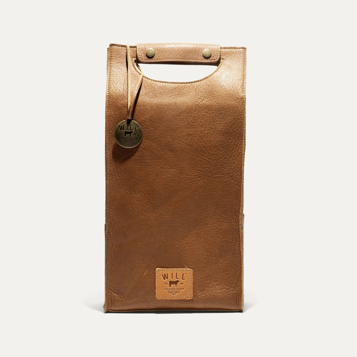 The WILL LEATHER GOODS - DOUBLE LEATHER WINE CASE is a brown full-grain leather tote featuring a top handle cutout, two metal snaps, round metal tag, and stitched "WILL" label—ideal for carrying wine in style.