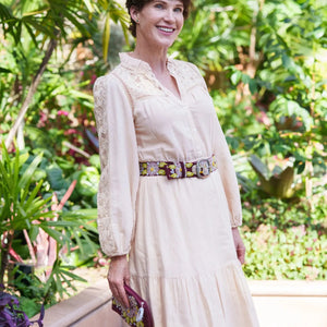 JENNY KRAUSS - MORNING GLORY FLORAL EMBROIDERED BELT, a coiled burgundy wool belt with intricate, multi-colored floral embroidery and an oval buckle, handcrafted in Peru.