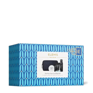 The ELEMIS - MEN'S 1ST CLASS GROOMING KIT by ELEMIS - STEINER features a dark blue travel bag behind five men's skincare products, including facial wash, Pro-Collagen Marine Cream for Men, two tubes, a small bottle, and shaving gel.