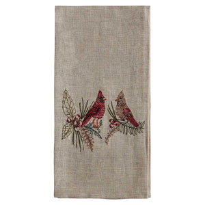 A CORAL & TUSK CHRISTMAS CARDINALS LINEN TEA TOWEL made of embroidered natural flax fiber featuring two cardinals perched on pine branches with berries.
