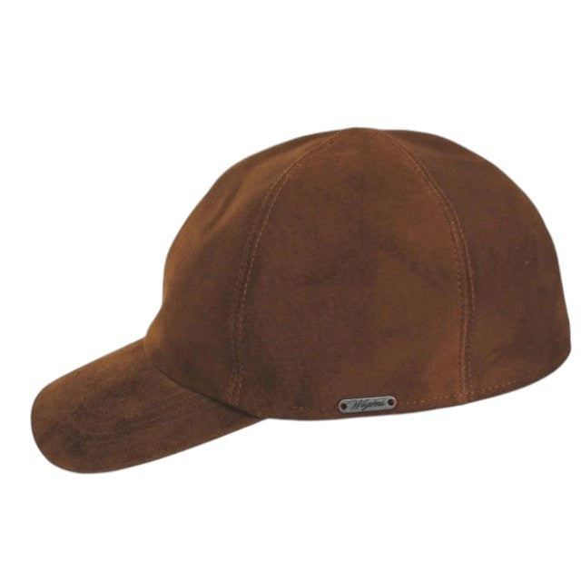 The WIGENS - CLASSIC SUEDE BASEBALL CAP IN BROWN is crafted from brown suede and features a curved brim, visible panel stitching, and a subtle metallic WIGENS label on the side. This timeless fitted cap by WIGENS is displayed against a plain white background.