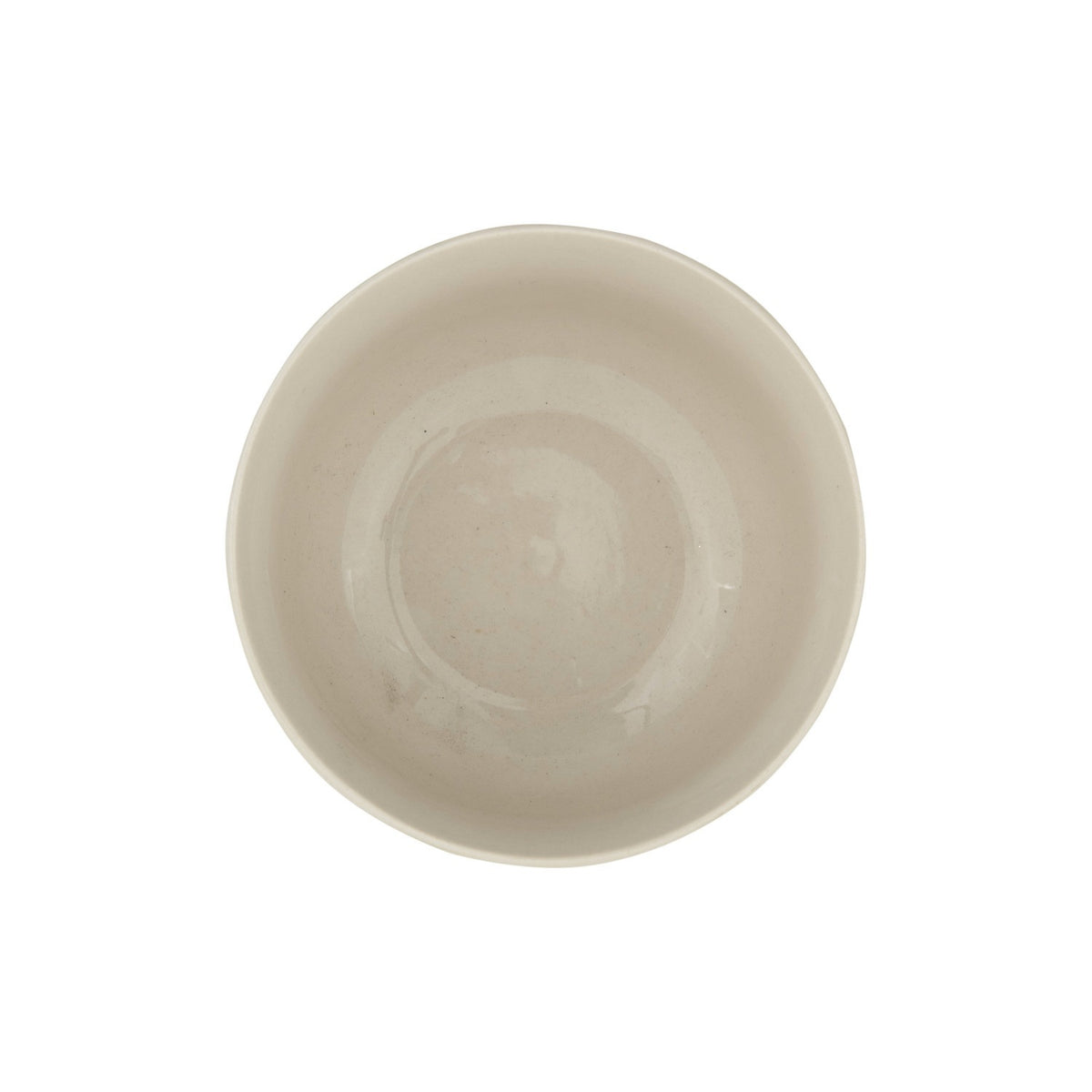 The HAND-STAMPED STONEWARE BOWL WITH BOTANICAL PATTERN by CREATIVE COOP features green leaf and fern illustrations encircling its white ceramic exterior, offering an artisan-inspired look.