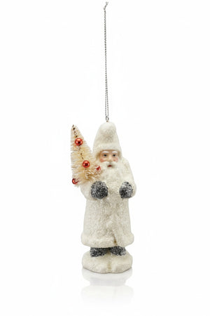 A white Creative Coop Vintage Belsnickel Ornament With Sisal Bottle Brush holds a miniature sisal tree decorated with small red ornaments.
