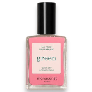 A hand with short, neatly manicured nails painted with MANUCURIST - GREEN™ Nail Polish in Pink Paradise by MANUCURIST INC rests on a cream-colored knitted fabric.