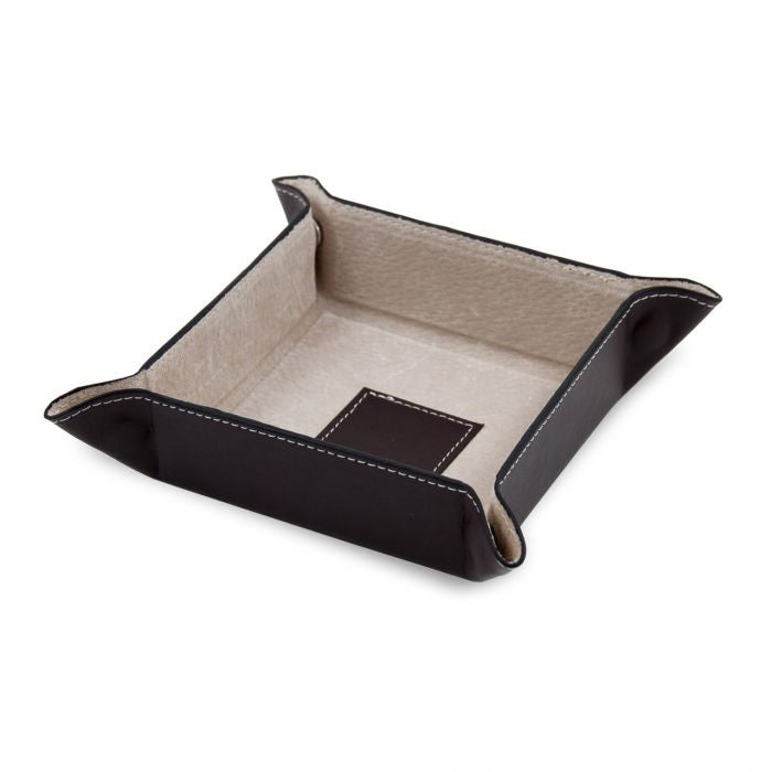 The BEYBERK INTERNATIONAL LEATHER VALET IN DARK BROWN features a square shape, pigskin leather lining, beige interior, white stitching, and raised sides with snapped corners, shown on a white background.