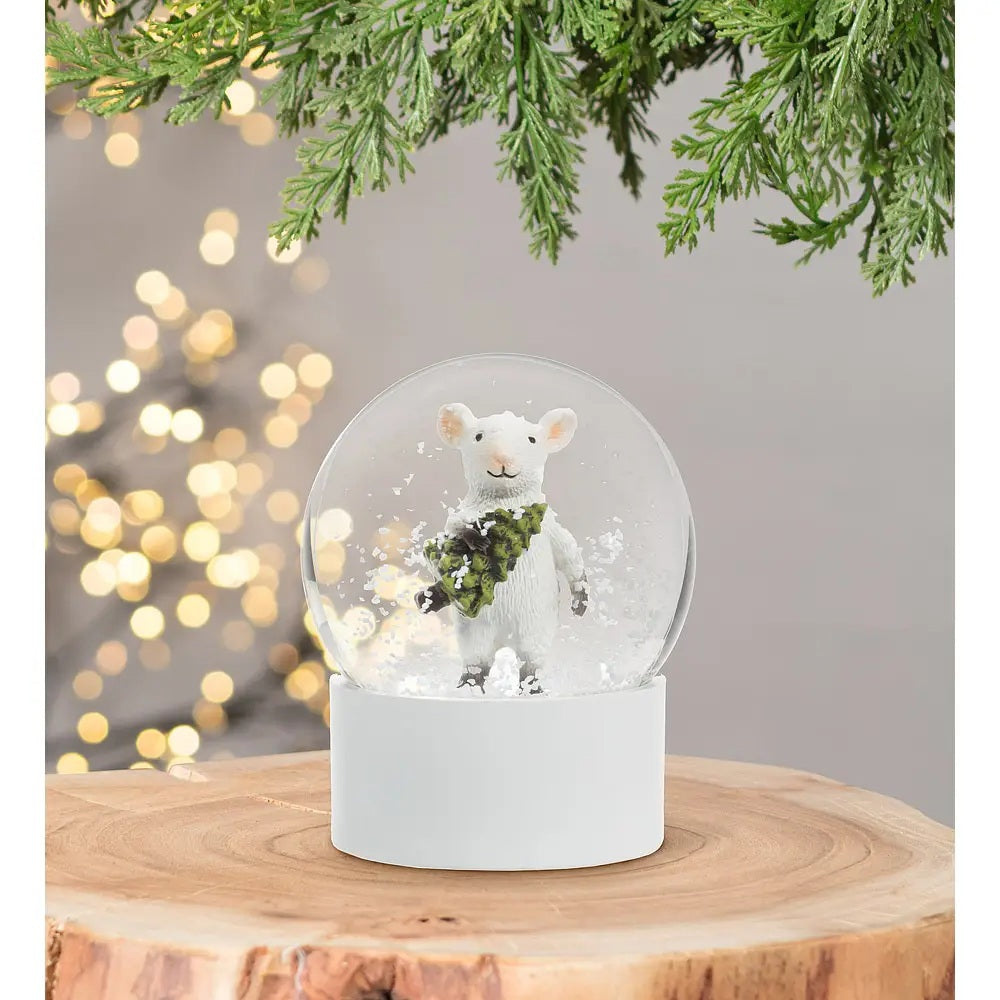 An ABBOTT MOUSE WITH TREE SNOW GLOBE featuring a white mouse carrying a small green tree.