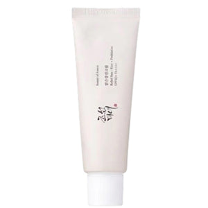 A white plastic tube with a white cap, featuring black and red Korean text on the front. This is the BEAUTY OF JOSEON - RELIEF SUN SUNSCREEN from KOSMIC KBEAUTY SKINCARE—a lightweight SPF50+ sunscreen, possibly formulated with rice extract, making it ideal for daily skincare routines.