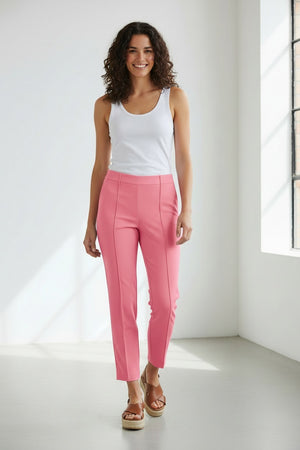 The MAC - ANNA PULL ON PANT by MAC features high-waisted, straight-leg pink trousers made from easy-care fabric, with front creases and small hem slits, shown on a white background.