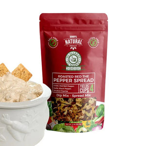 A red packet of TO MARKET - ROASTED RED PEPPER SPREAD DIP MIX from TO MARKET- DIPS & SPREADS stands upright beside a white bowl filled with creamy dip and crackers. The packaging highlights that the mix is all-natural, makes 4 cups, and is both gluten-free and salt free. Infused with smoked paprika, this bold, smoky spread is perfect for adding robust flavor to any gathering.