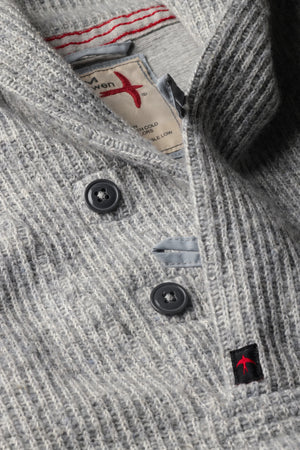 The RELWEN Ridge Twist Shawl Sweater in Pale Grey Heather is a vintage-style piece with ribbed cuffs and hem, a hood, and a small tag near the neckline, shown laid flat on a white background.