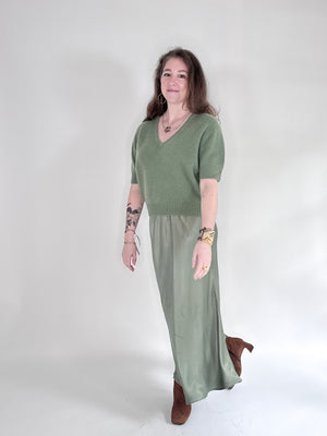 The ROSE & CROWN Cashmere Short Sleeve V Neck Sweater in deep red is shown on a white hanger against a plain white background.