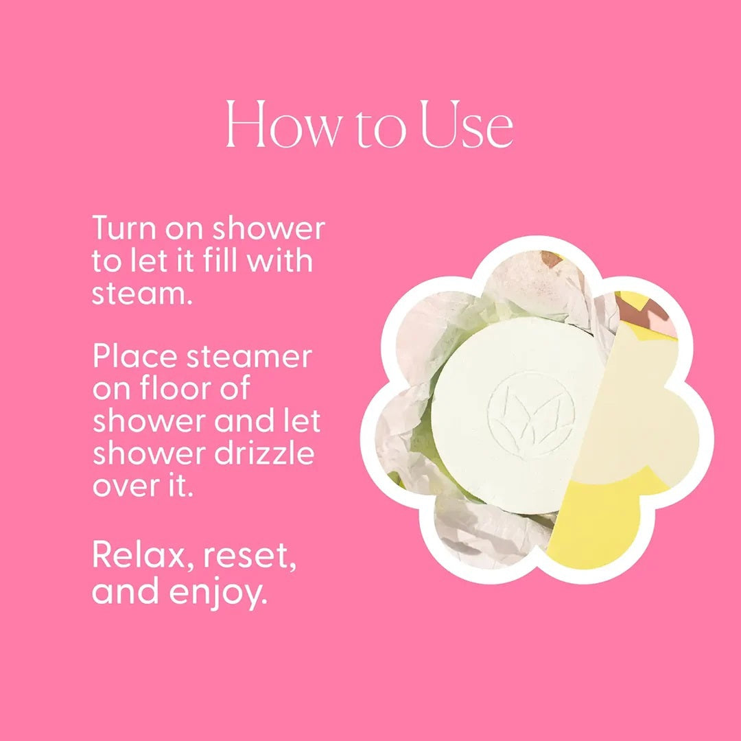 A green box labeled “MUSEE - BAMBOO & LOTUS SHOWER STEAMERS” is displayed, featuring four white round steamers embossed with a leaf design in front. The brand name “MUSEE” appears above the product name, highlighting these natural shower steamers crafted to deliver a spa-like experience.