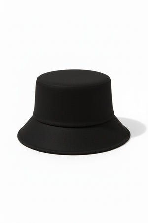 WYETH's TENLEY BUCKET HAT, a blue bucket hat made from fuzzy mohair wool and featuring a wide brim, is presented against a simple white background.