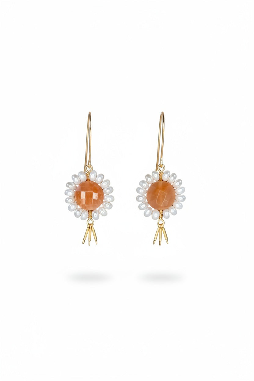 GOLDISH - Floral Gemstone Earrings in Pink Moonstone and White Pearl feature delicate 14K gold fill fringe beneath pink moonstones and white pearls, displayed on a white stand for an elegant look.