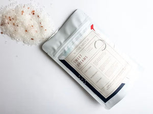 A white stand-up pouch labeled "Native Nectar Sweet Dreams Salt Soak." The product description states it includes lavender and chamomile, with soothing Epsom salt and lavender essential oil for muscle relaxation. Directions, ingredients, cautions, website, and origin information are also listed.