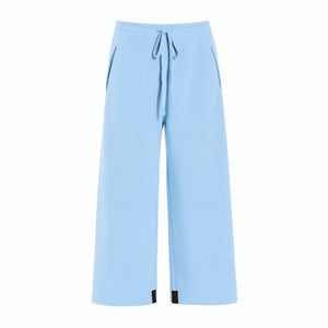 Here’s a rewritten version using your product data: A sizing guide chart for the HENRIETTE STEFFENSEN - FLEECE FLARED CROPPED TROUSER by HENRIETTE STEFFENSEN, featuring measurements for chest, waist, and hips in centimeters for sizes XS to XXL—including information specific to fleece pants and flared trousers—with separate charts for normal and loose fits, plus a diagram illustrating where to measure.