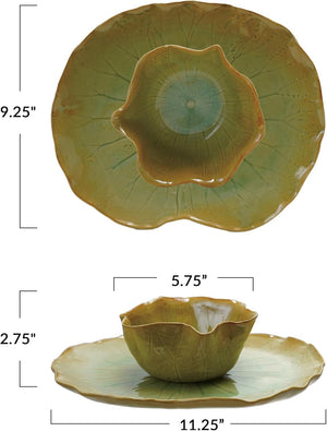 The CREATIVE COOP STONEWARE WATER LILY PLATE WITH BOWL IN REACTIVE CRACKLE GLAZE features veined, green leaf shapes and wavy edges, resembling natural leaves from the side view.