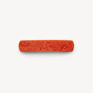 The MACHETE No. 3 Heirloom Barrette in Poppy is a rectangular, handmade red hair accessory with rounded edges and a textured finish, crafted from cellulose acetate and shown on a plain white background.