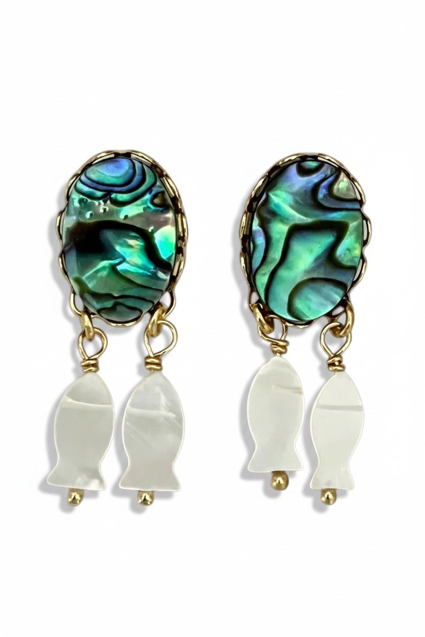 SANDRINE FRANCE STUDIO MINI Earrings: Handmade gold earrings with oval abalone cabochons featuring blue-green iridescence, each accented by two small Mother of Pearl fish charms. Crafted in NYC by SANDRINE FRANCE STUDIO.