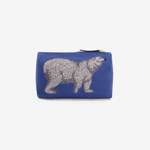 The INOUI EDITIONS - BEAR COSMETIC POUCH by INOUI is a blue zippered pouch made in India, featuring a detailed illustration of a brown bear walking, shown against a plain white background.