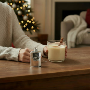 Cody Foster GLASS SILVER FLASK ORNAMENT shaped like a flask, featuring an anchor icon and the glittery silver text “DOWN THE HATCH” to celebrate holiday spirits.
