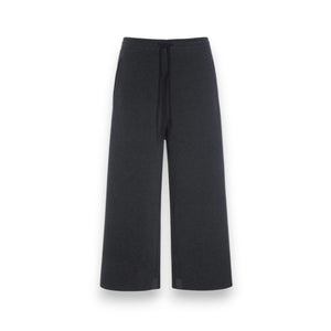 HENRIETTE STEFFENSEN - FLEECE FLARED CROPPED TROUSER: Black wide-leg fleece pants with an elastic waistband, front drawstring, and side pockets by HENRIETTE STEFFENSEN, shown against a white background.