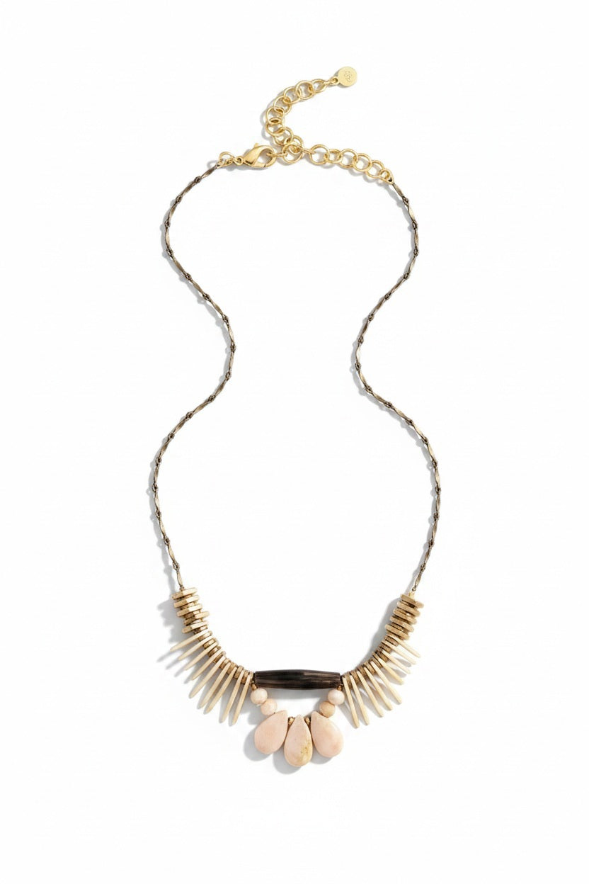 The DAVID AUBREY - ATHENA PEARL SMOKEY QUARTZ NECKLACE features a delicate gold chain, adjustable clasp, and fan-shaped pendant with cream and gold accents—a perfect handcrafted Mother's Day gift from DAVID AUBREY, shown on a gray background.