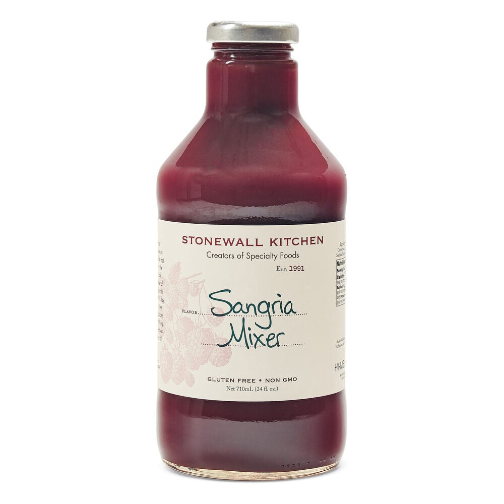 A glass bottle of STONEWALL KITCHEN - SANGRIA MIXER from STONEWALL KITCHEN features a maroon liquid, is labeled as gluten free and non-GMO, and has a metal cap with a cream-colored label displaying product details. Ideal for making fruity drinks or party cocktails.