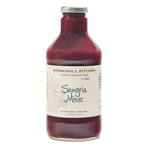 A glass bottle of STONEWALL KITCHEN - SANGRIA MIXER from STONEWALL KITCHEN features a maroon liquid, is labeled as gluten free and non-GMO, and has a metal cap with a cream-colored label displaying product details. Ideal for making fruity drinks or party cocktails.