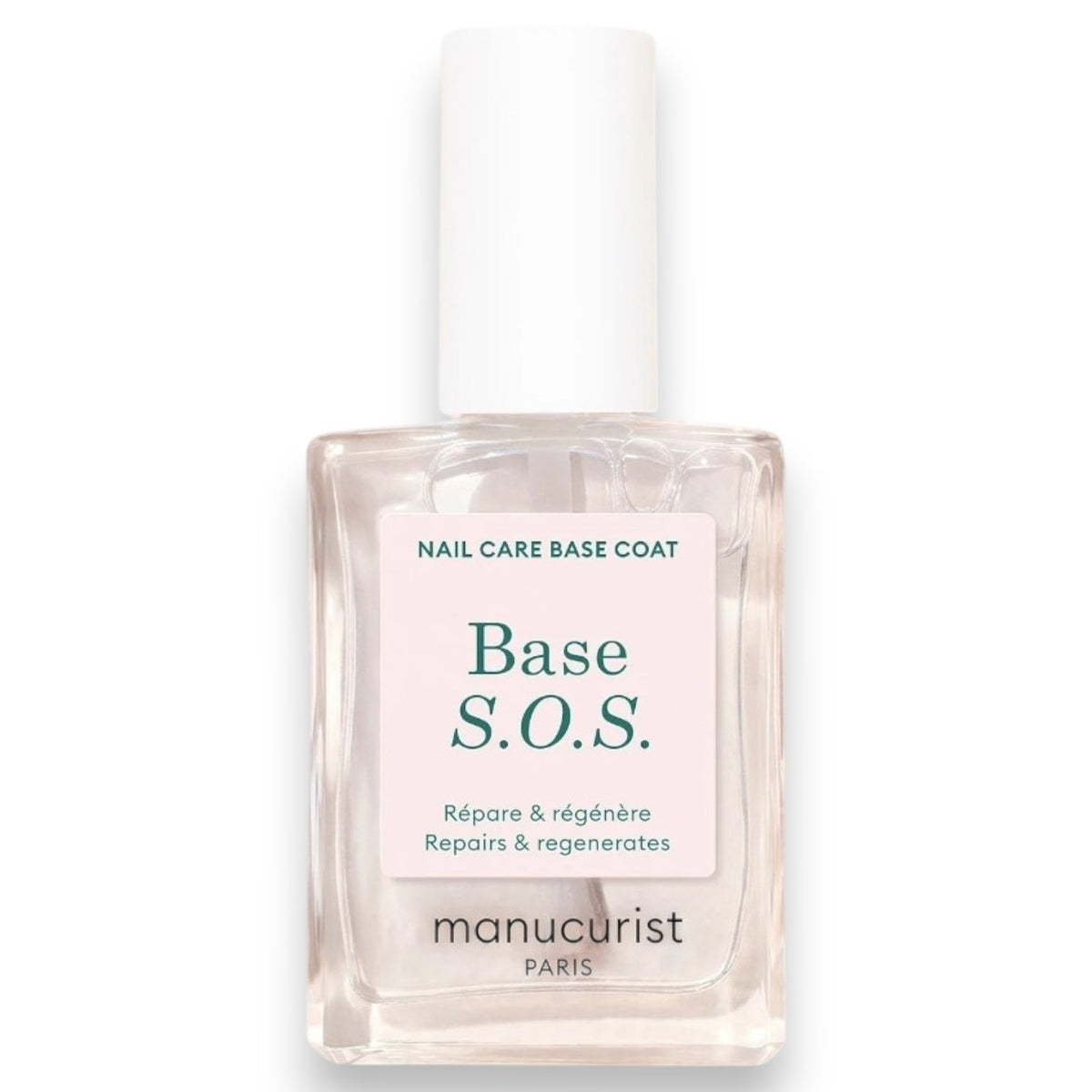 A clear glass bottle of MANUCURIST - S.O.S. NAIL STRENGTHENER BASE COAT by MANUCURIST INC, featuring a white cap and a label that reads “Répare & régénère – Repairs & regenerates.” This nourishing base coat is specially formulated to strengthen and restore damaged nails.